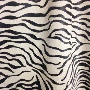 Baby Zebra on Off white Stenciled Cowhide fire pit, outdoor fire bowl