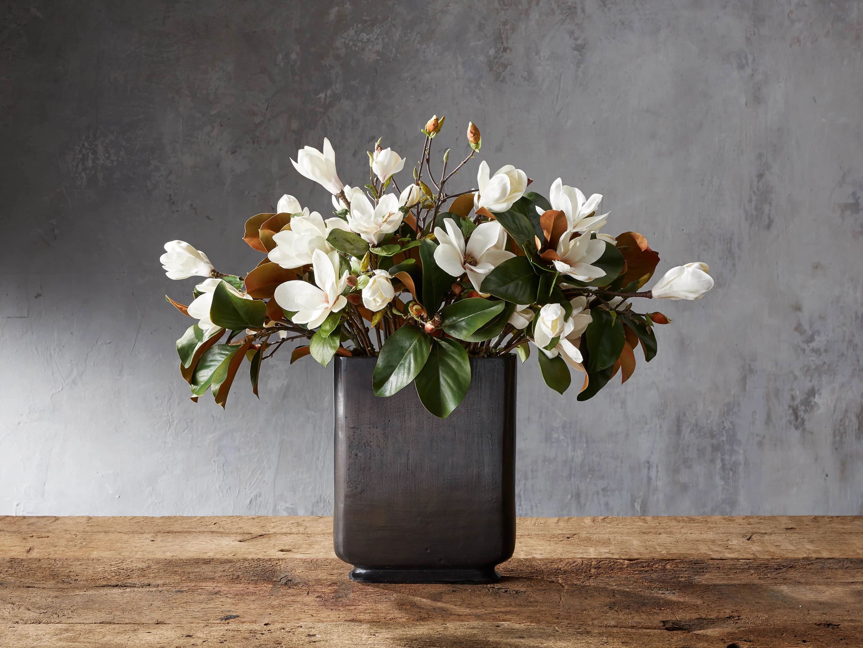 Faux Magnolia in Tall Bronze Vase