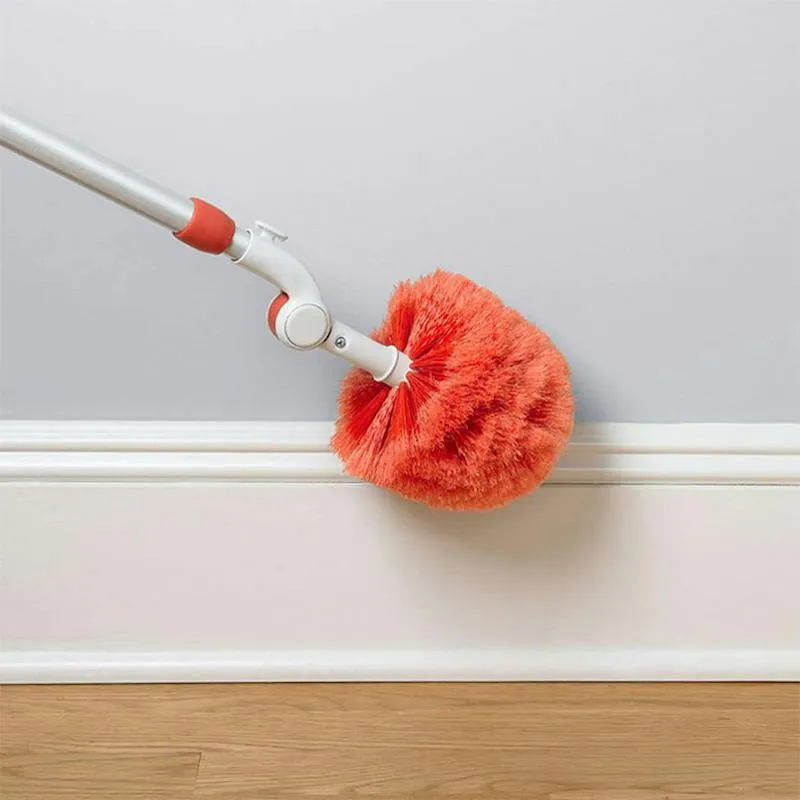 Long reach duster system with pivoting heads