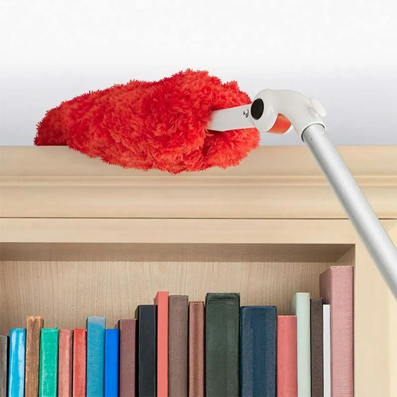 Long reach duster system with pivoting heads