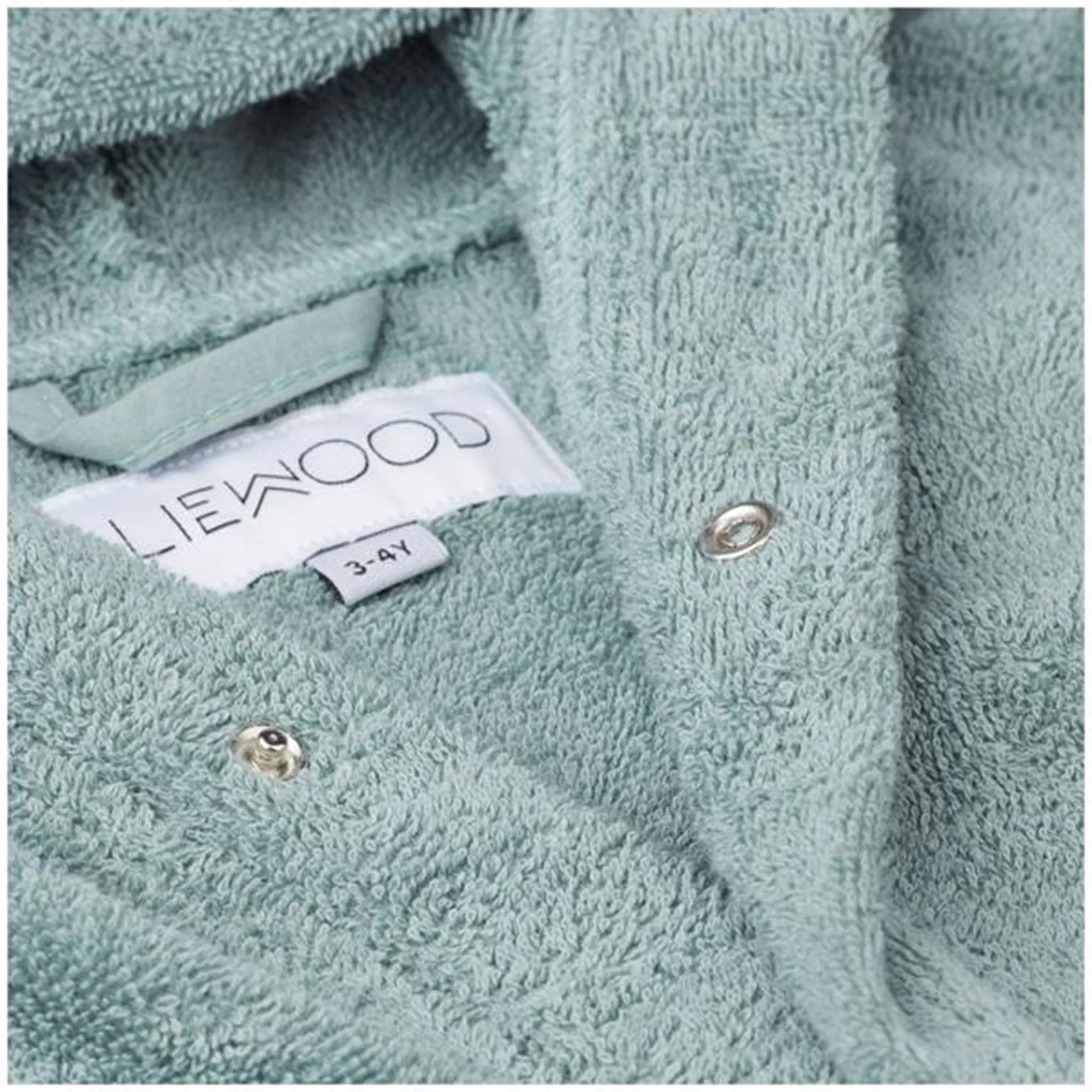 Petit Crabe Rose Nude Palma Onesie with Zipper